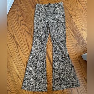 SHEIN leopard flared leggings.